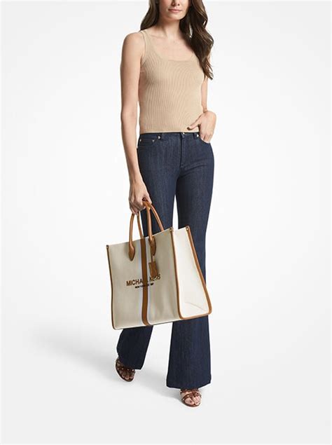 michael kors gold kanvas bag|mirella large canvas tote bag.